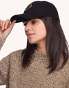 Schwarze OLOW Blossom Yourself Cap am Model – seitliche Vorderansicht