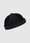 Cleptomanicx Brimless Cord Cap in Schwarz – Vorderansicht