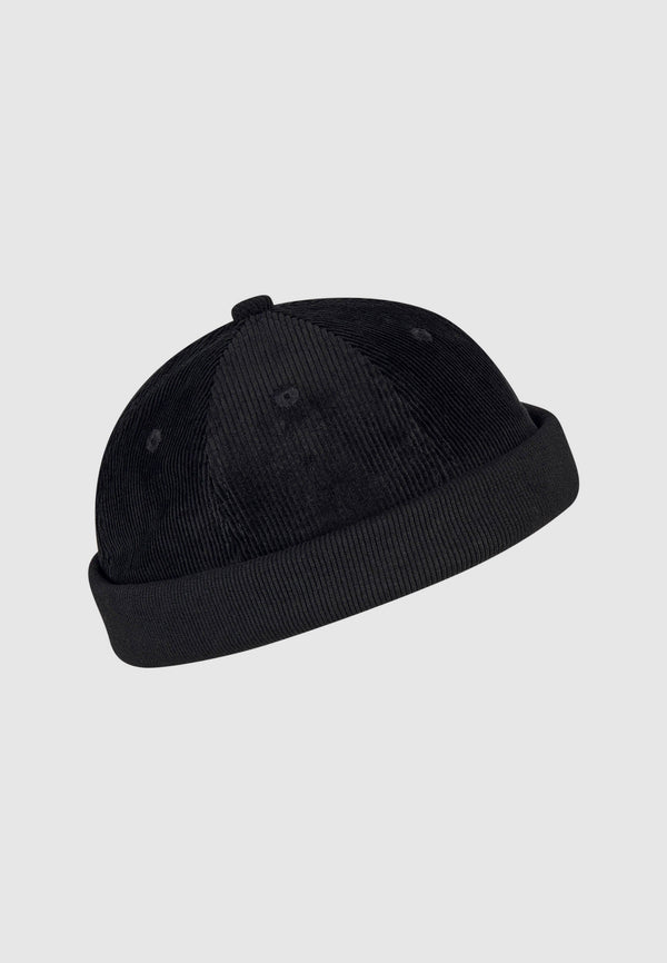 Cleptomanicx Brimless Cord Cap in Schwarz – Vorderansicht