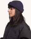 OLOW Falco Merinowoll-Beanie am Model – linke Seitenansicht
